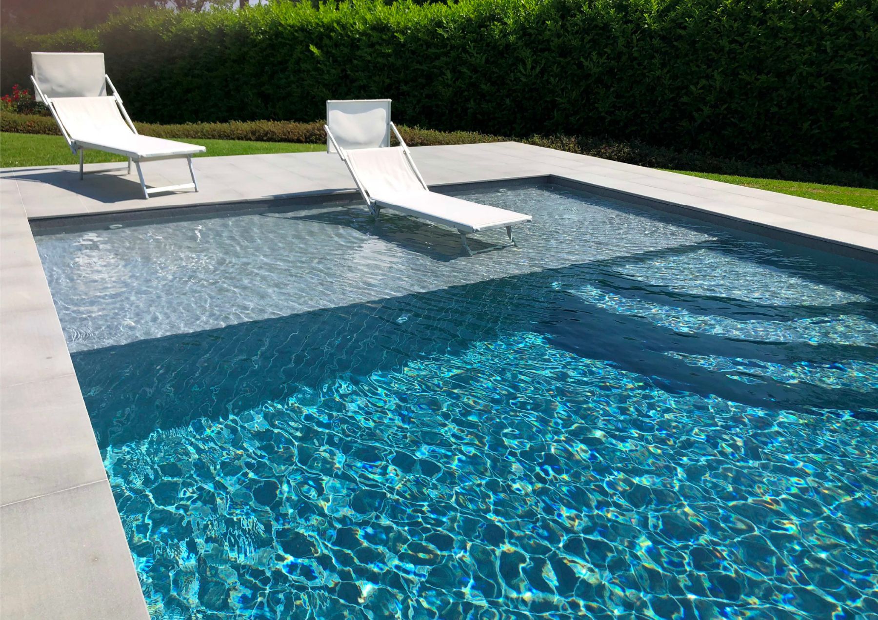 Piscina a skimmer con spiaggetta e telo TOUCH PRESTIGE.