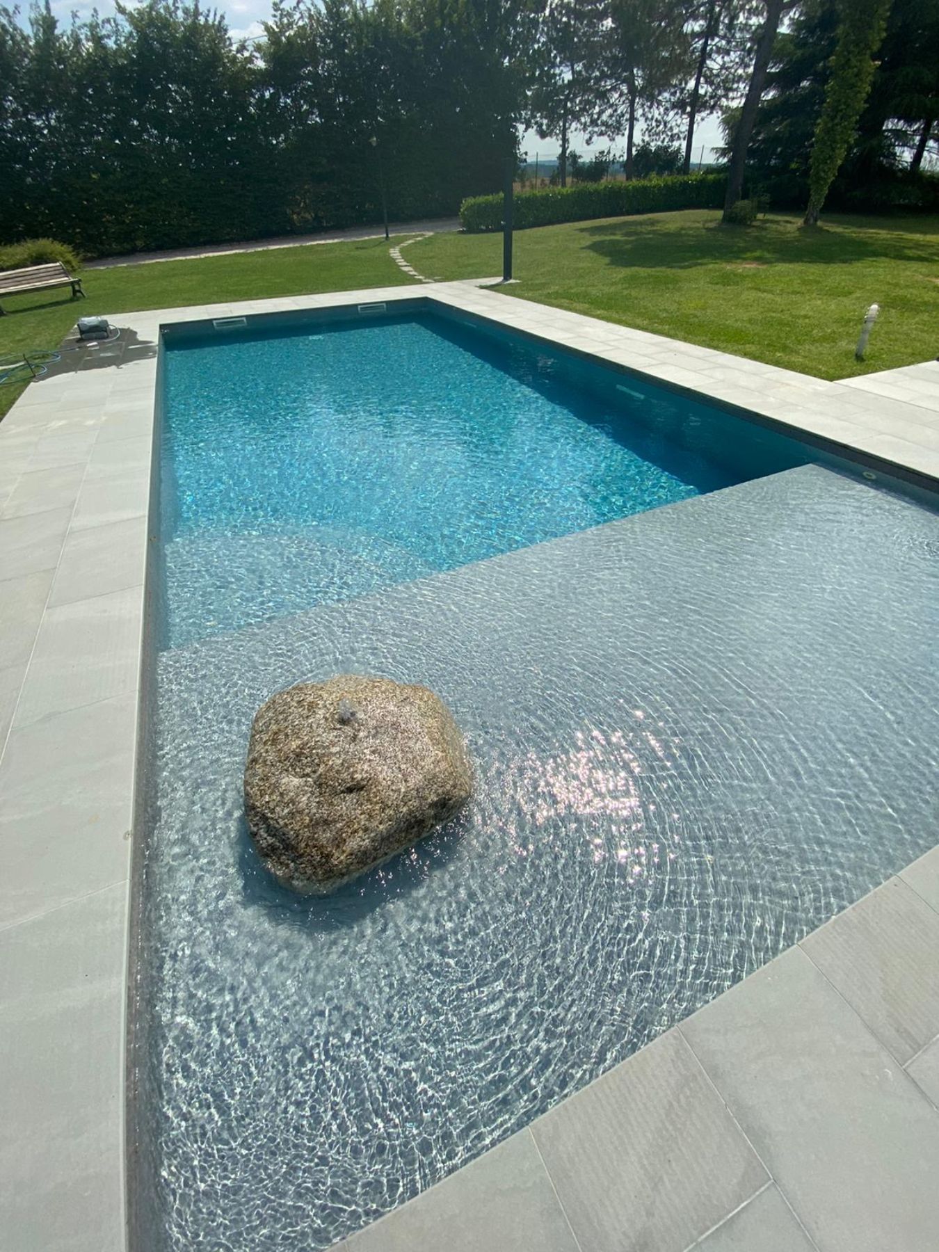 Piscina a skimmer con spiaggetta e telo TOUCH PRESTIGE.